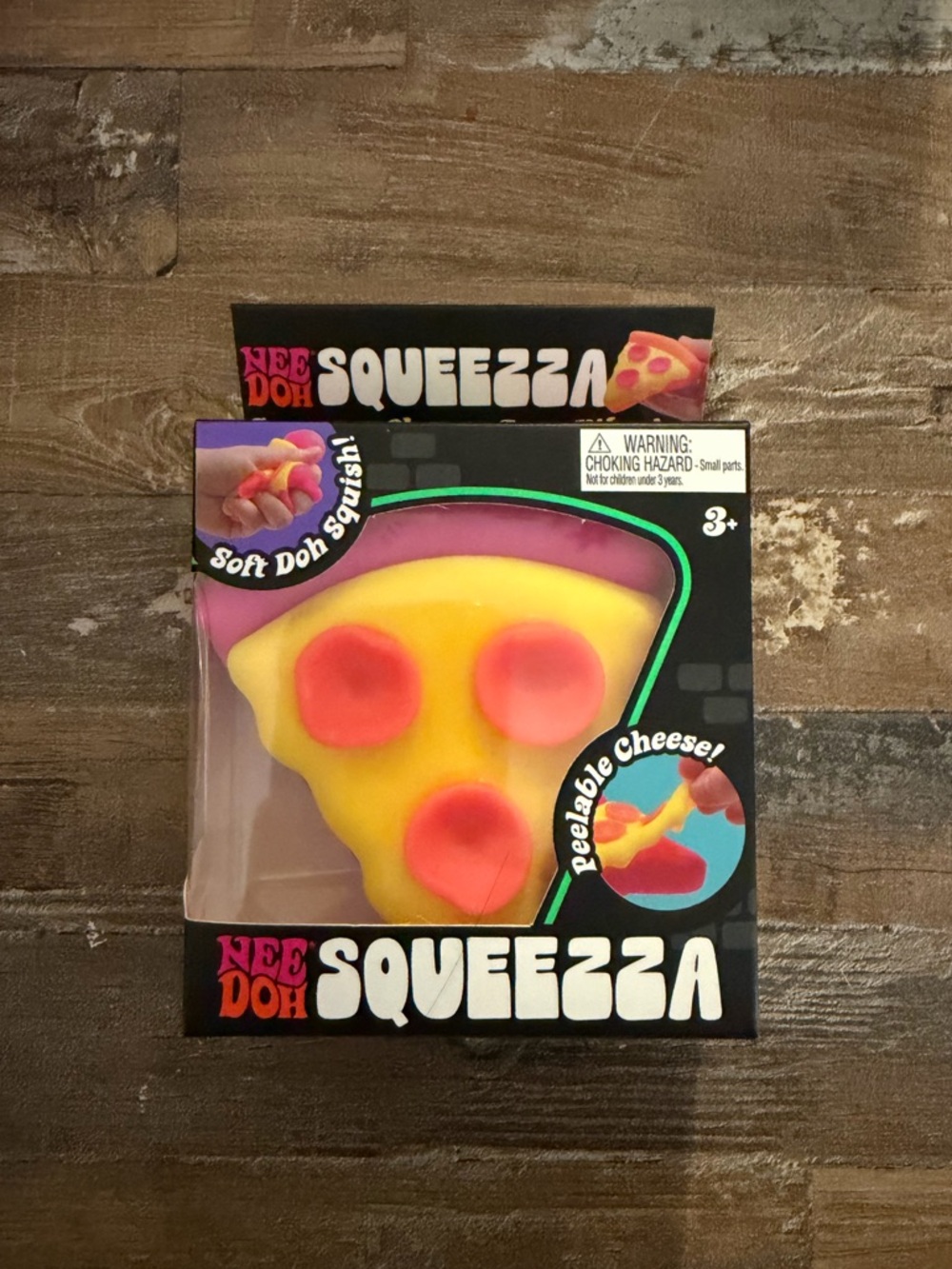 NeeDoh Squeeza Pizza Slice Soft Squishy Toy - Yellow with Pink Toppings
